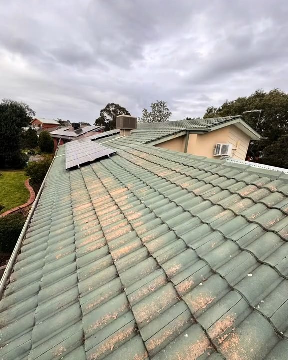 A tiled roof as ZX found it: faded and weathered