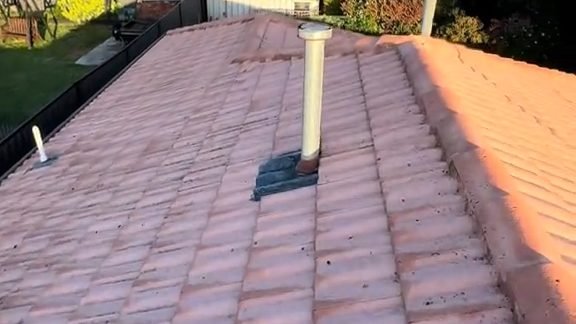 After: a terracotta tile roof
