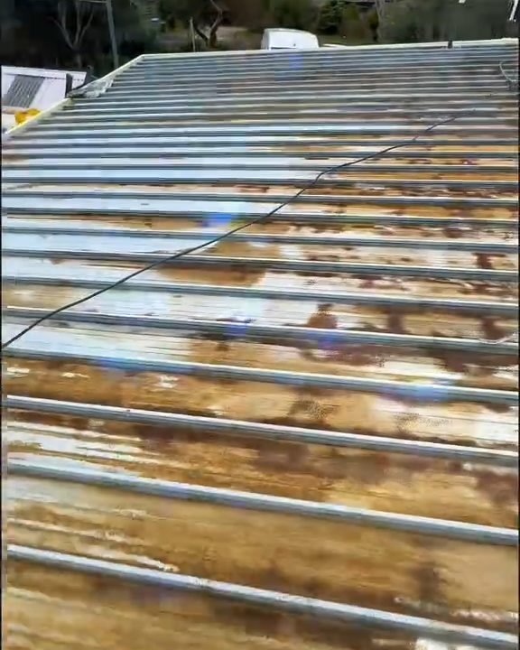 Before: a metal roof